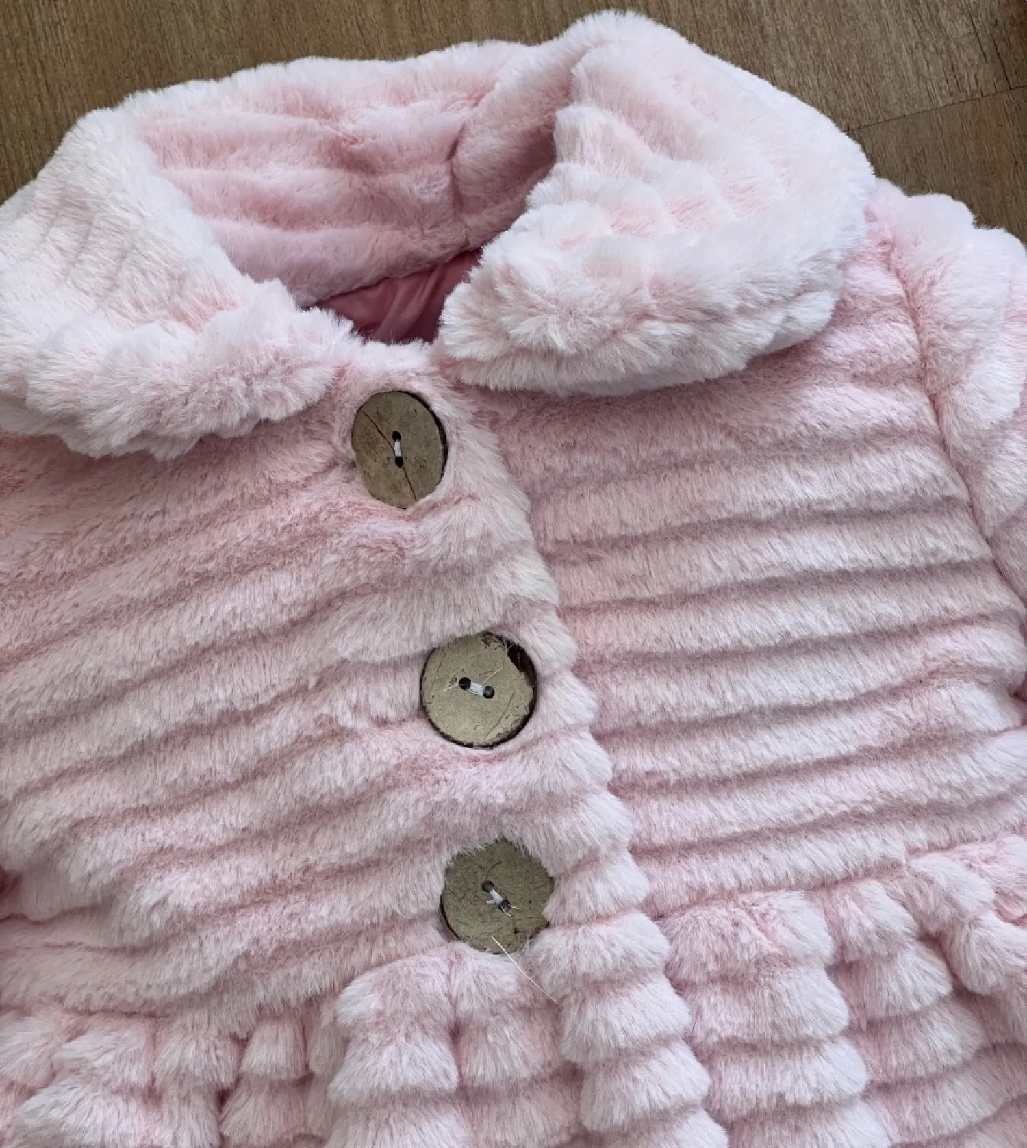 Pink or beige striped fur coat for girl