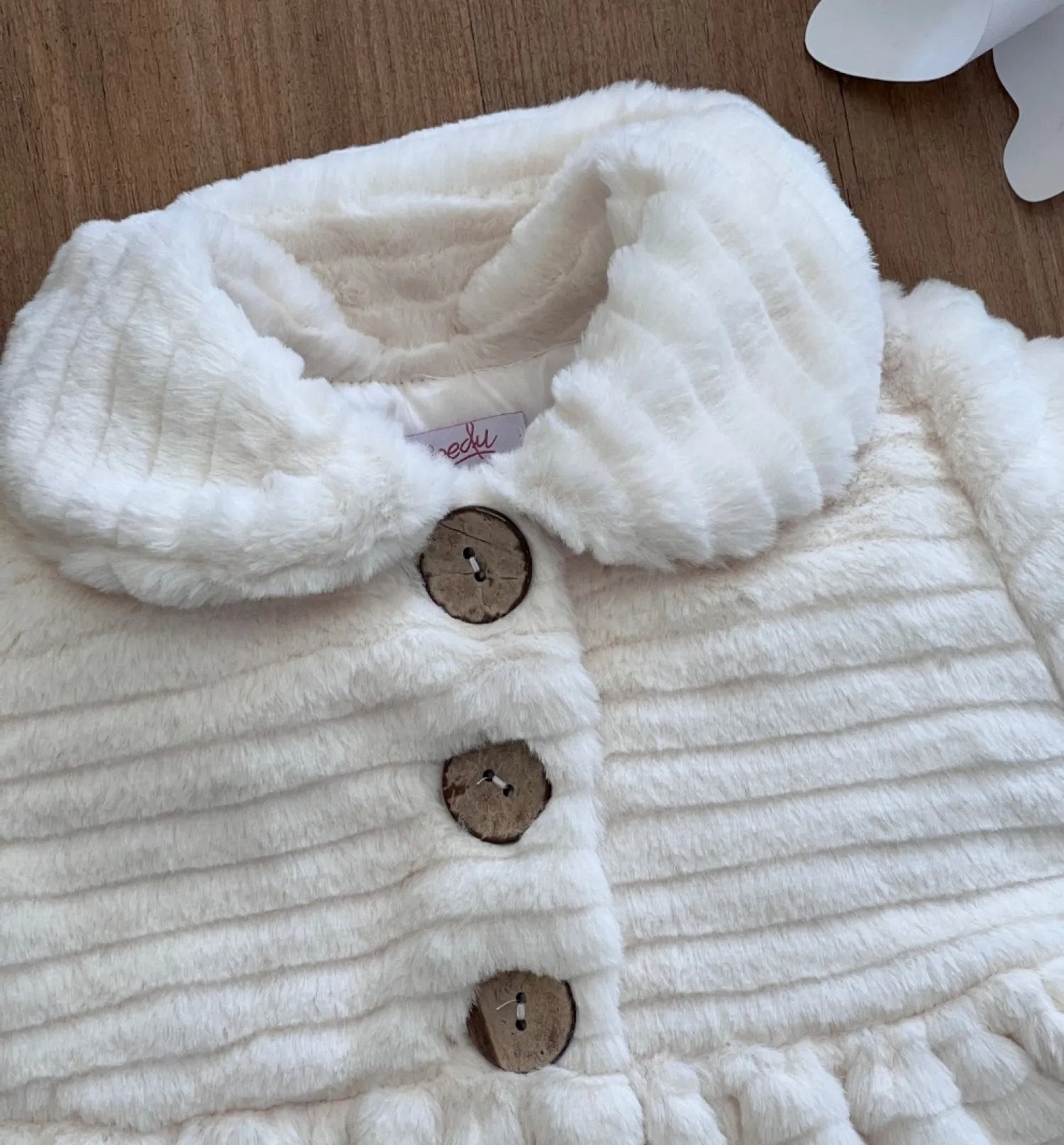 Pink or beige striped fur coat for girl